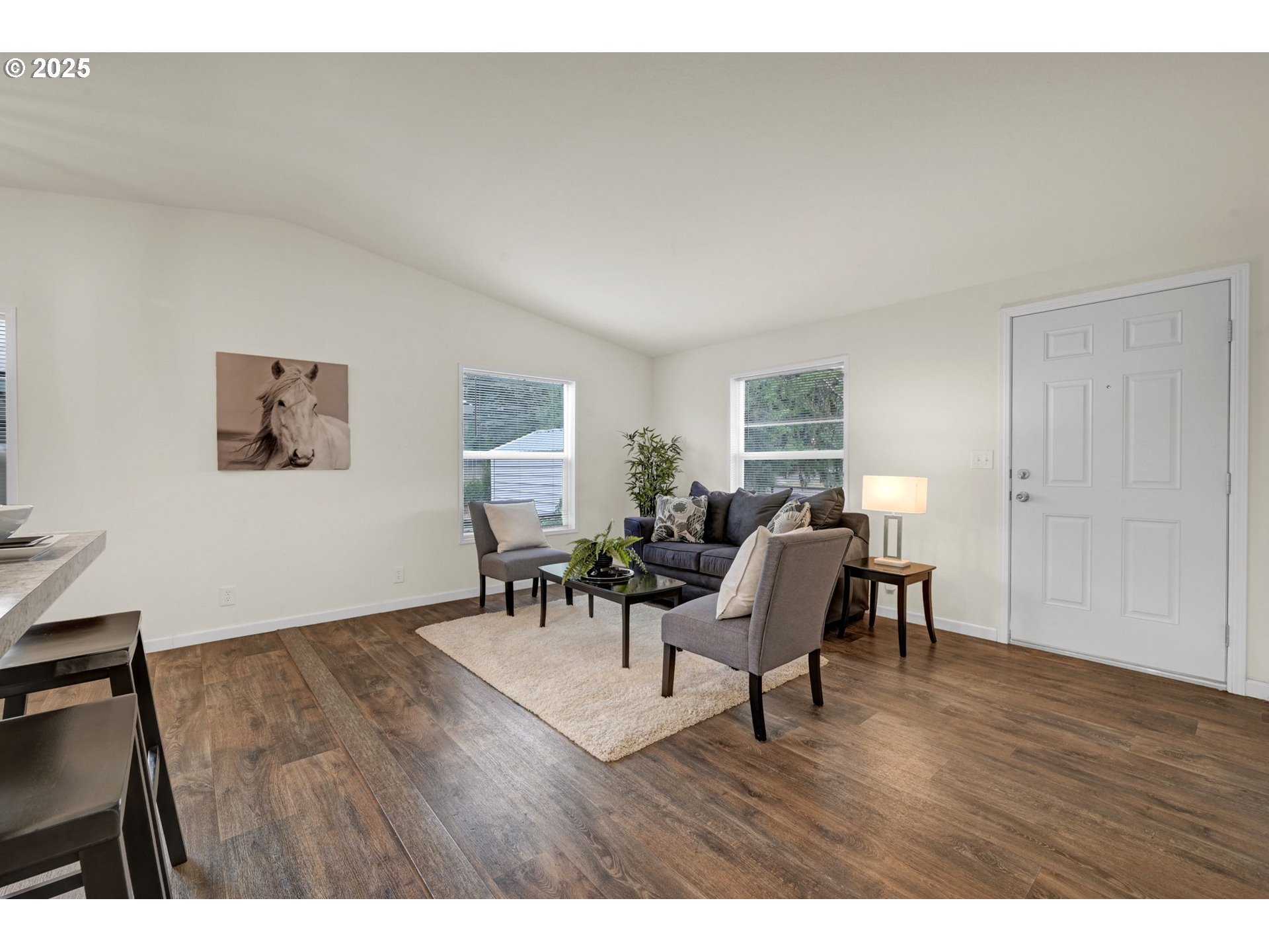 87886 Cedar Flat Road Springfield, OR 97478 - Photo 5 of 34 a view of a livingroom with furniture and wooden floor