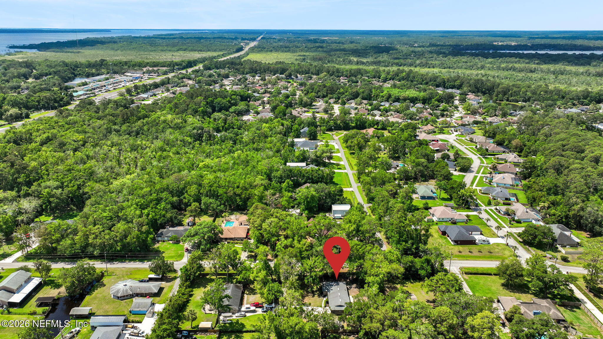 3194 Creighton Landing Road Fleming Island, FL 32003 - Photo 29 of 31 a view of a bunch of trees and bushes