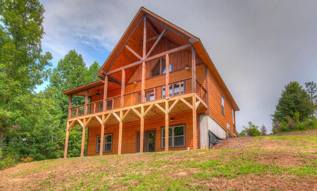 front view of building with a yard