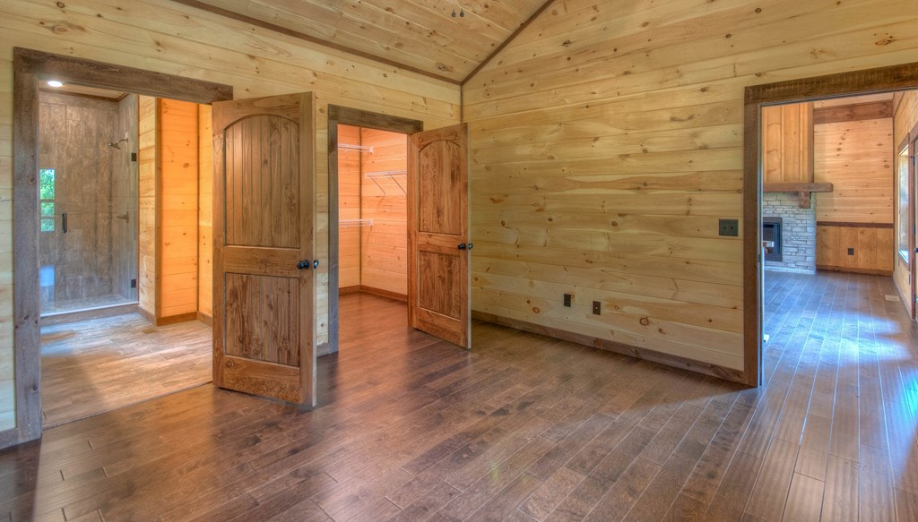 57 Devin Drive Murphy, NC 28906 - Photo 11 of 36 a view of a hallway with wooden floor and staircase