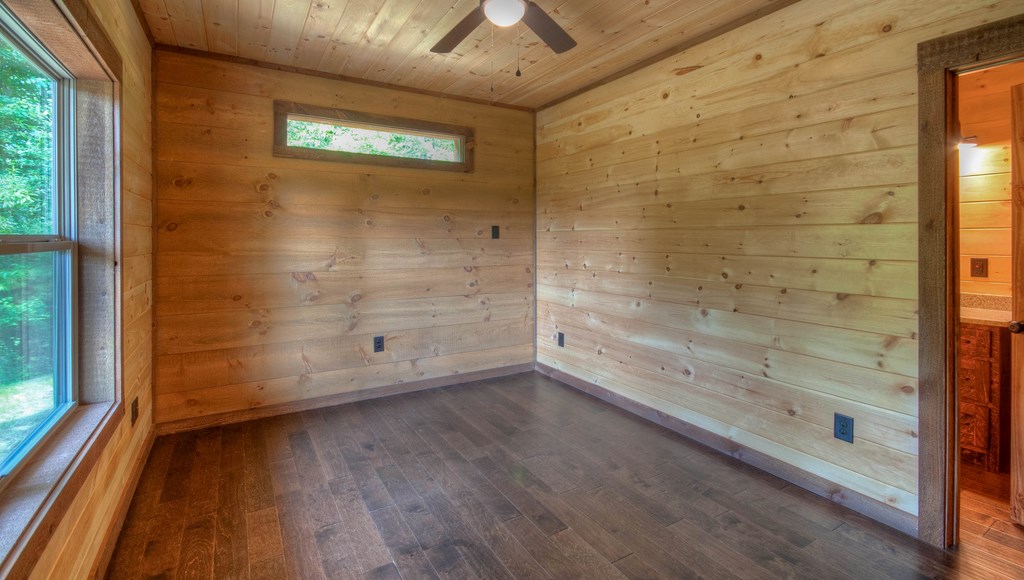 57 Devin Drive Murphy, NC 28906 - Photo 19 of 36 a view of empty room with wooden floor and fan