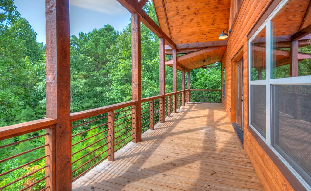 57 Devin Drive Murphy, NC 28906 - Photo 26 of 36 a view of a porch with wooden floor and outdoor space
