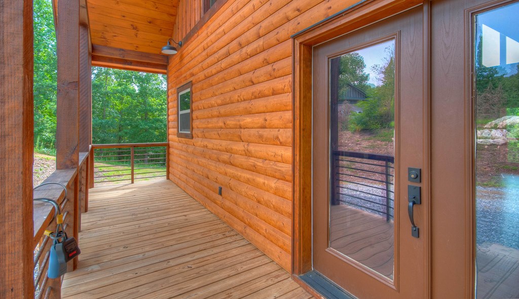 57 Devin Drive Murphy, NC 28906 - Photo 29 of 36 a view of porch with wooden floor and door