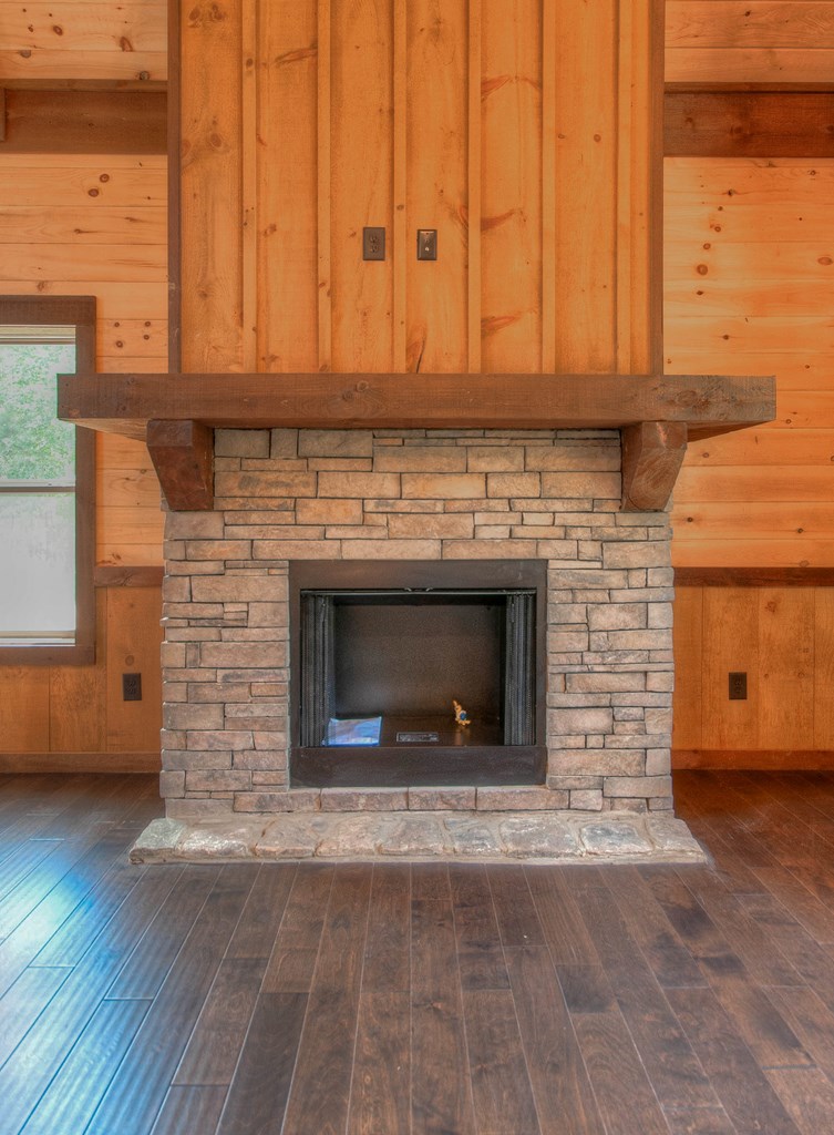 57 Devin Drive Murphy, NC 28906 - Photo 8 of 36 a view of a fireplace with wooden floor