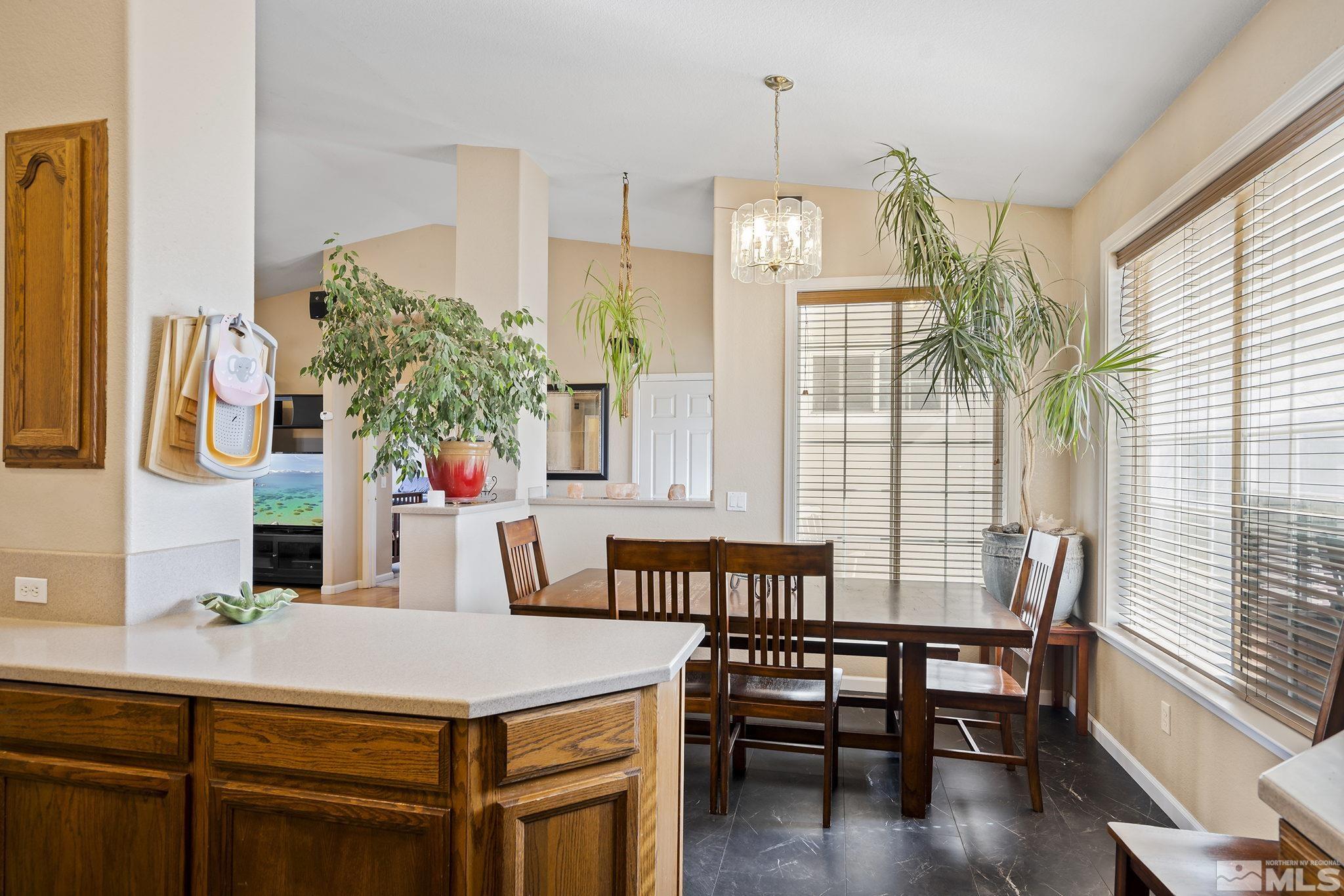 8650 Wise Reno, NV 89506 - Photo 9 of 25 a view of a dining room with furniture and window