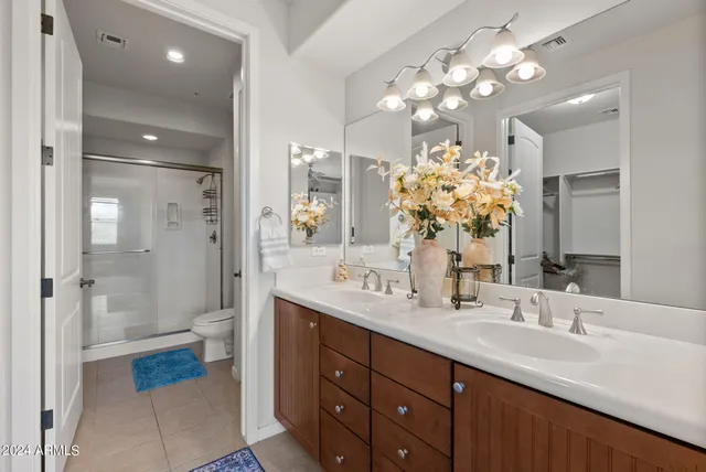 a bathroom with a shower and a toilet