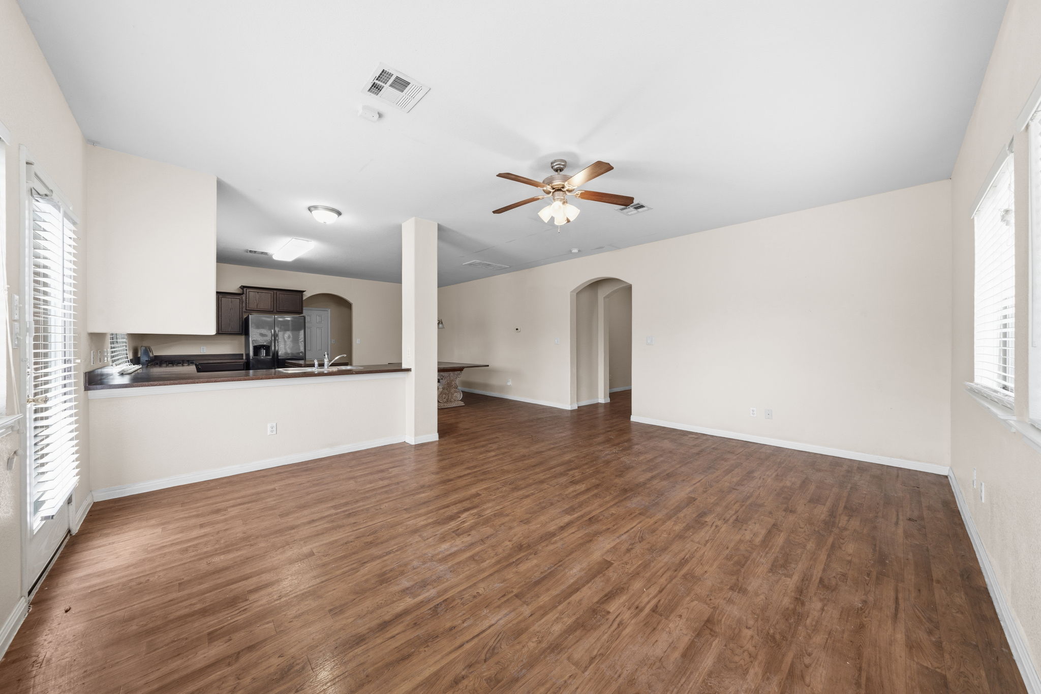 601 Silver Wing Drive Austin, TX 78725 - Photo 2 of 15 a view of kitchen with sink and wooden floor