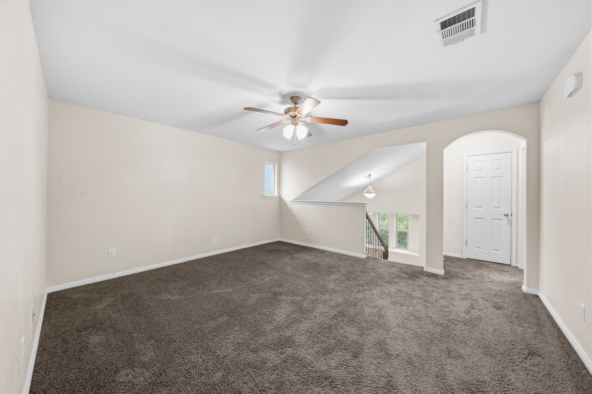 601 Silver Wing Drive Austin, TX 78725 - Photo 7 of 15 wooden floor in an empty room