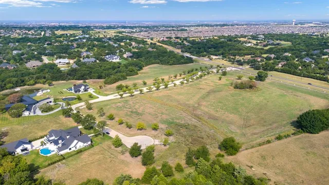 an aerial view of a tennis ground and a terrace view