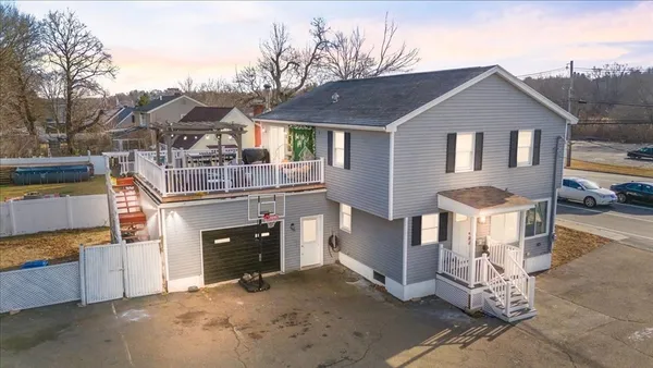 a front view of a house with a garage