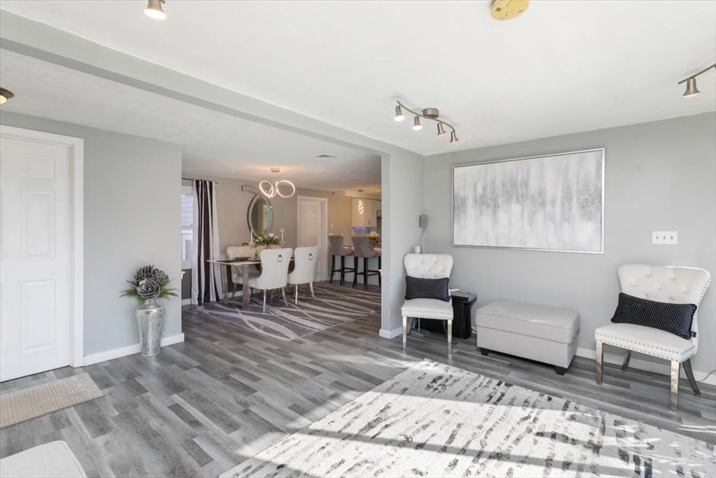 11 Andover Street Danvers, MA 01923 - Photo 11 of 41 a living room with furniture and wooden floor