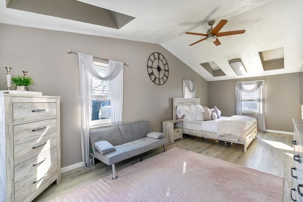 11 Andover Street Danvers, MA 01923 - Photo 21 of 41 a living room with furniture and a window