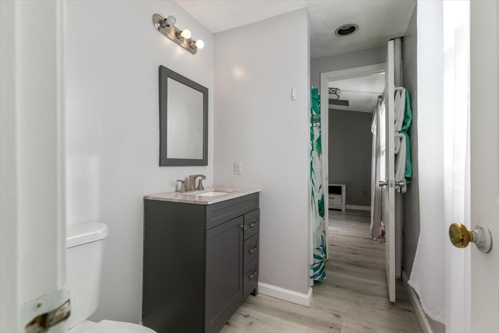 11 Andover Street Danvers, MA 01923 - Photo 24 of 41 a bathroom with a sink and a mirror