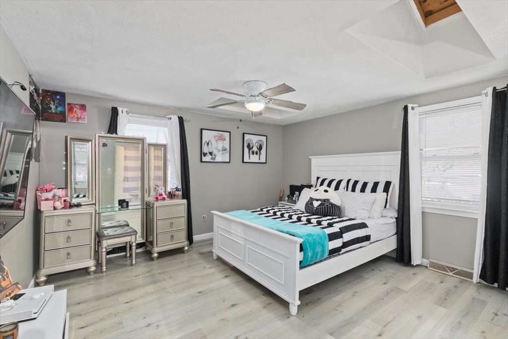 11 Andover Street Danvers, MA 01923 - Photo 28 of 41 a bed room with a bed and a window