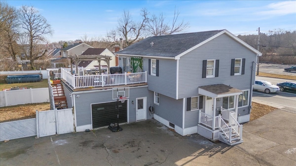 11 Andover Street Danvers, MA 01923 - Photo 4 of 41 a front view of a house with yard