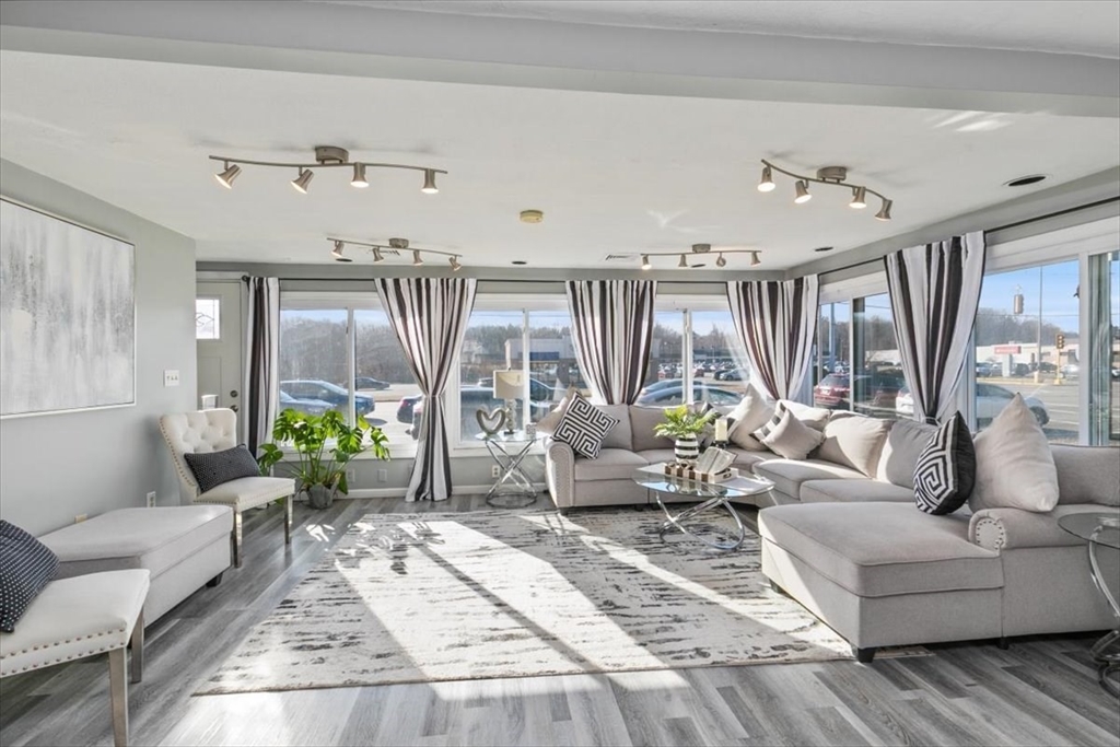 11 Andover Street Danvers, MA 01923 - Photo 9 of 41 a living room with furniture and a large window