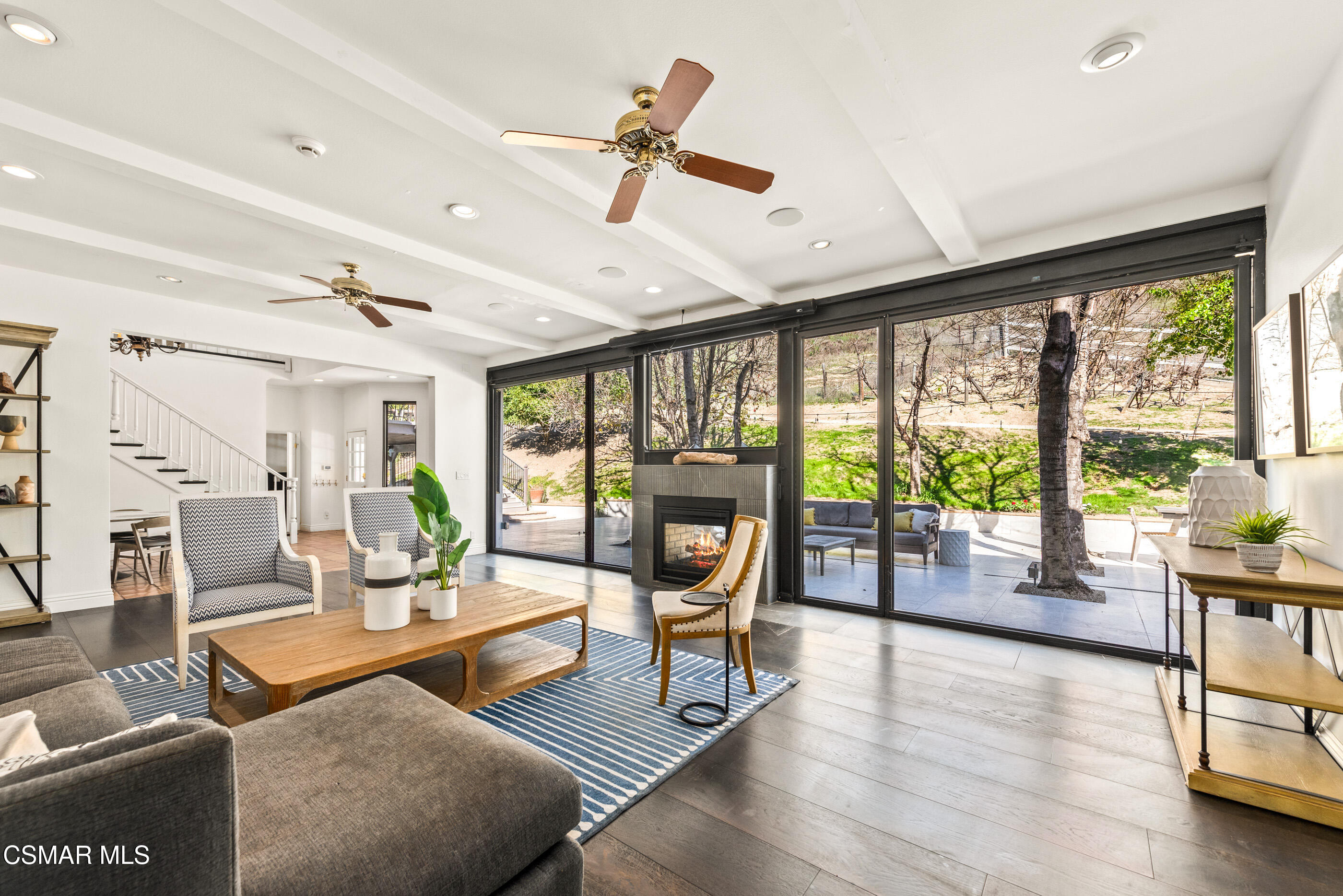 6144 Chesebro Road Agoura Hills, CA 91301 - Photo 15 of 73 a living room with furniture large windows and wooden floor