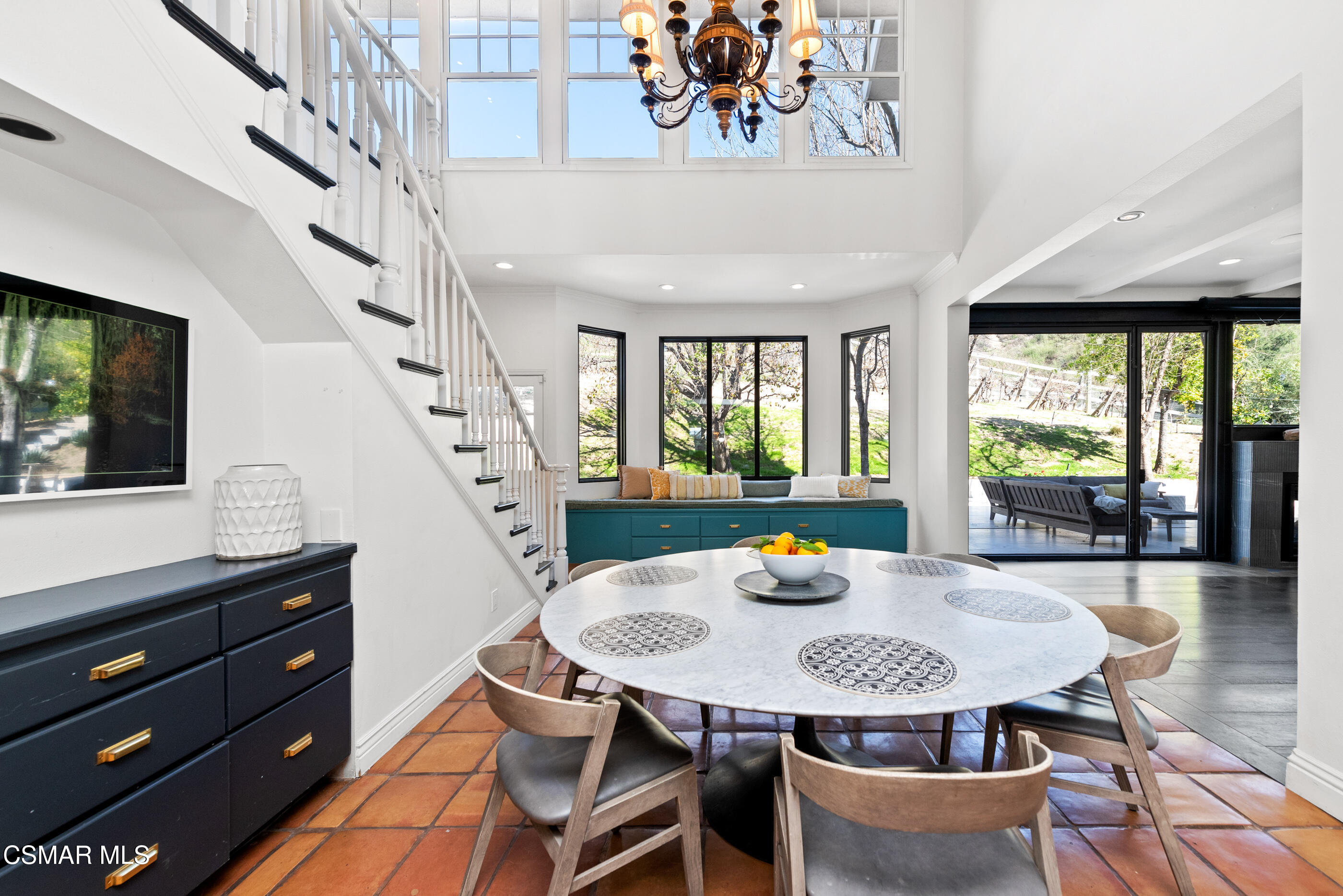 6144 Chesebro Road Agoura Hills, CA 91301 - Photo 18 of 73 a view of a dining room with furniture and a large window