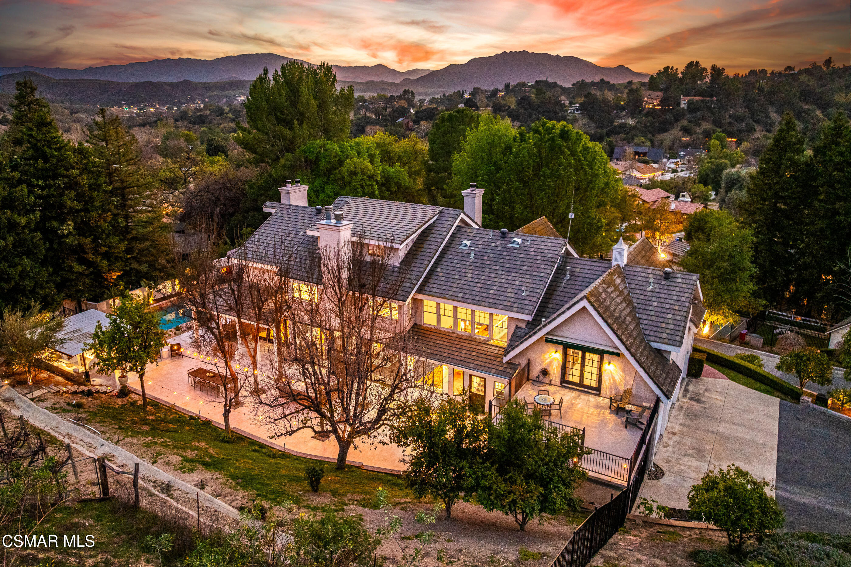 6144 Chesebro Road Agoura Hills, CA 91301 - Photo 3 of 73 an aerial view of a house with a mountain in the background