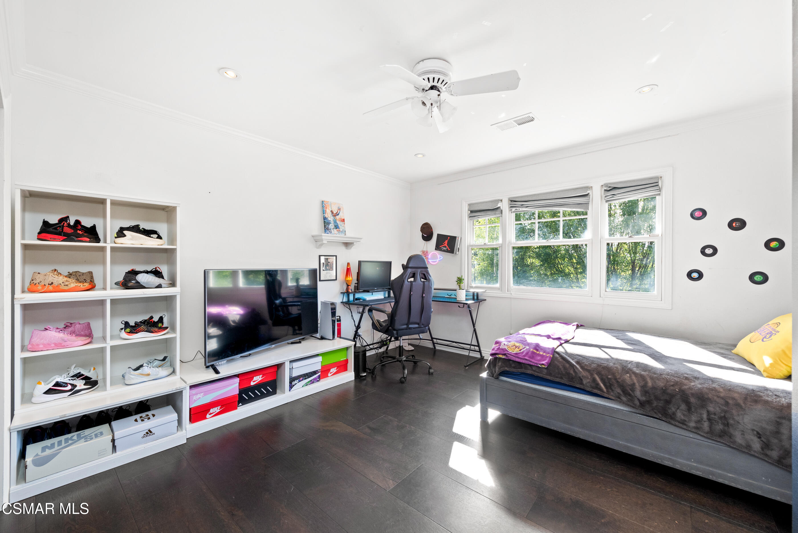 6144 Chesebro Road Agoura Hills, CA 91301 - Photo 39 of 73 a bedroom with furniture and a flat screen tv