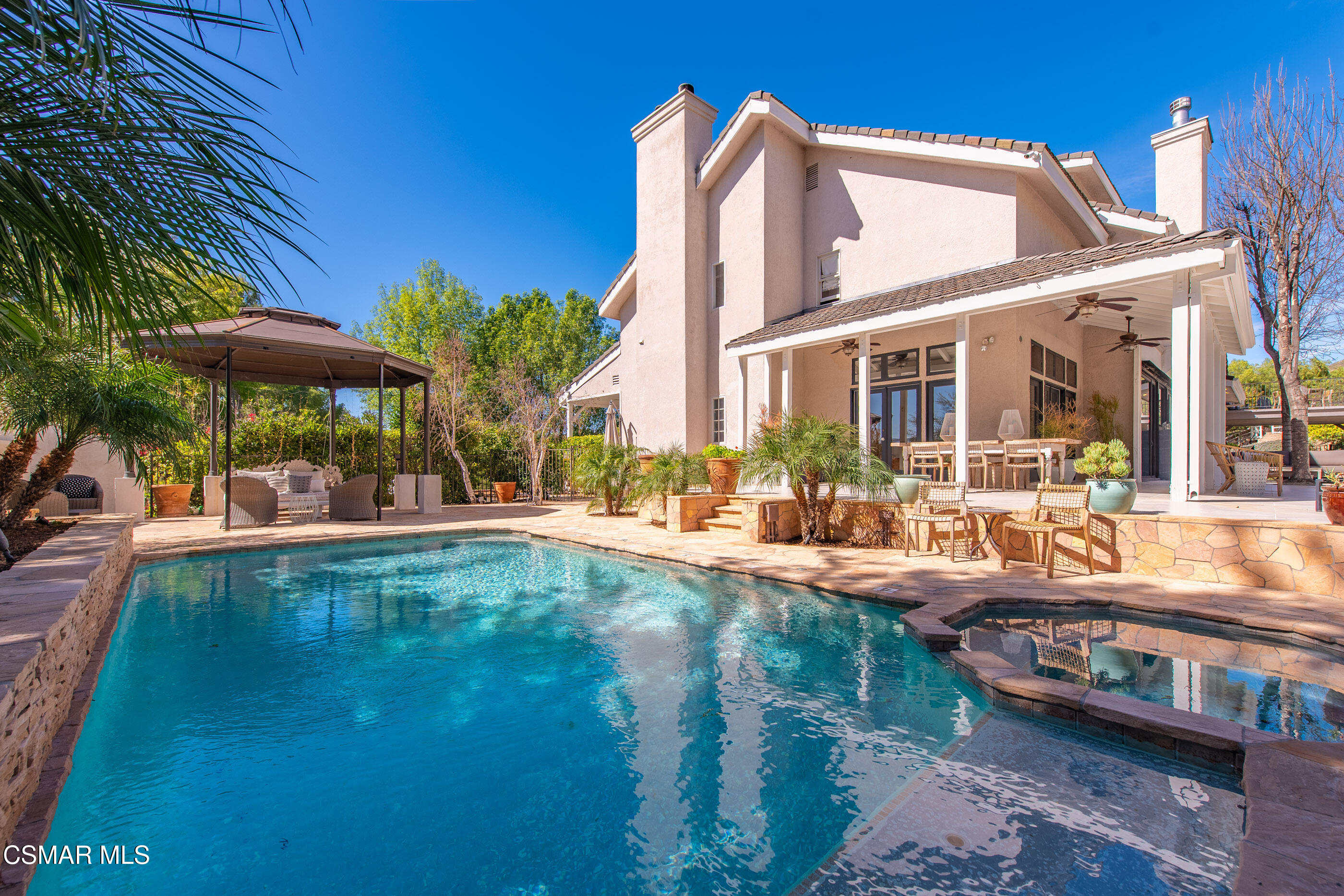 6144 Chesebro Road Agoura Hills, CA 91301 - Photo 44 of 73 a view of a swimming pool with a patio