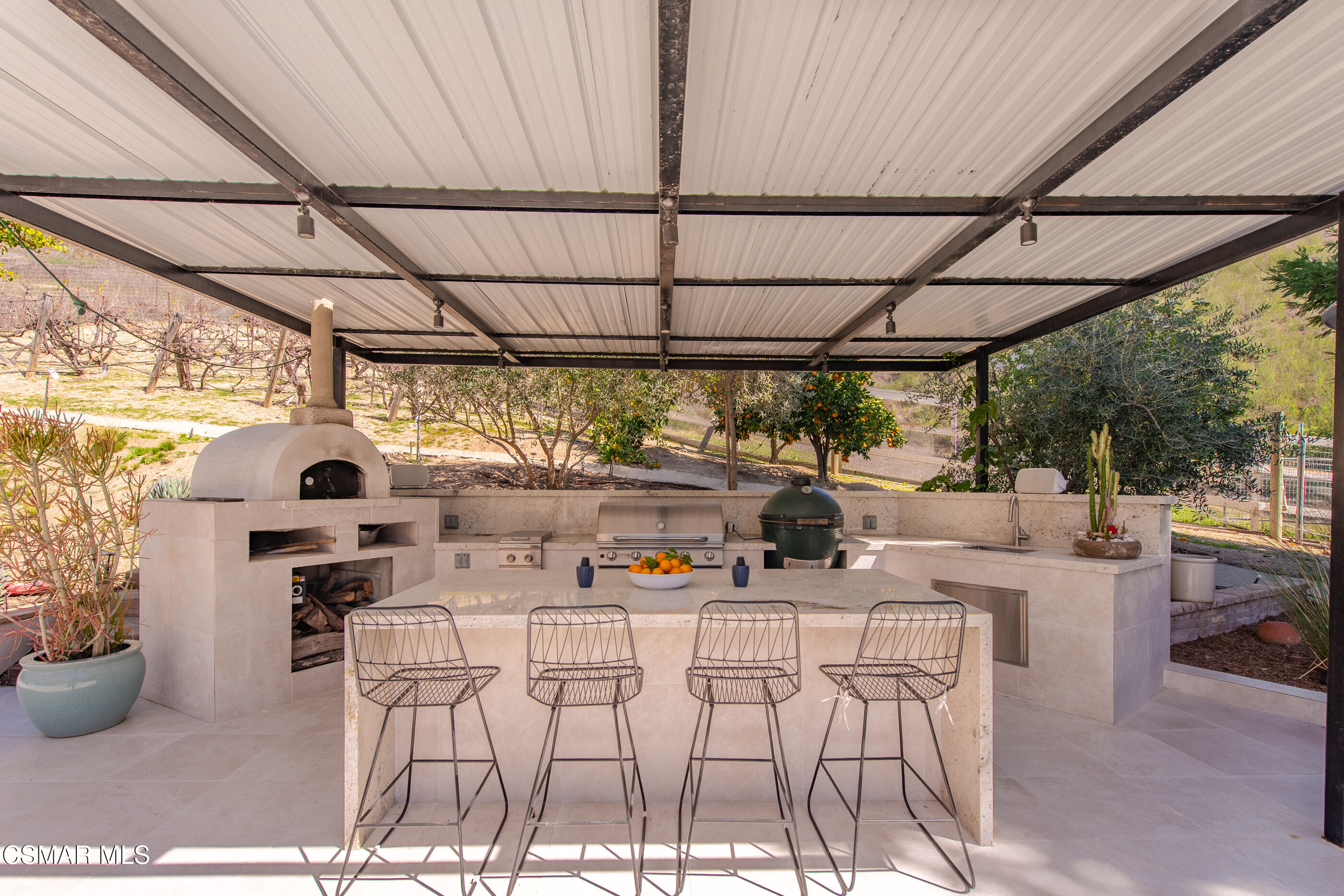 6144 Chesebro Road Agoura Hills, CA 91301 - Photo 46 of 73 a view of a chairs and table in a patio