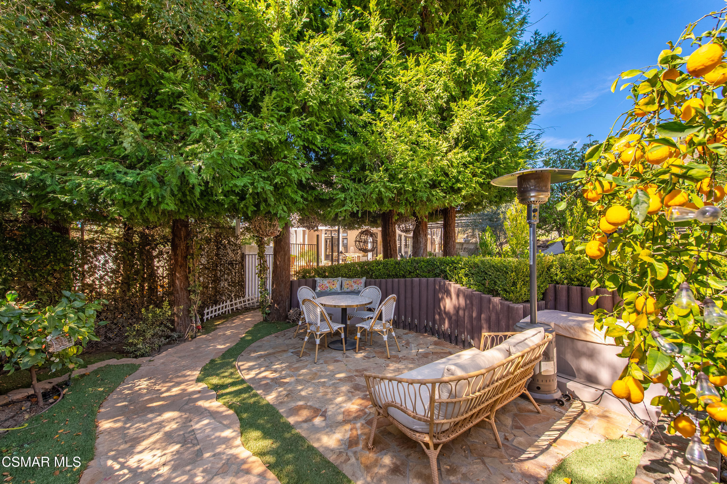 6144 Chesebro Road Agoura Hills, CA 91301 - Photo 48 of 73 a view of a backyard with sitting area