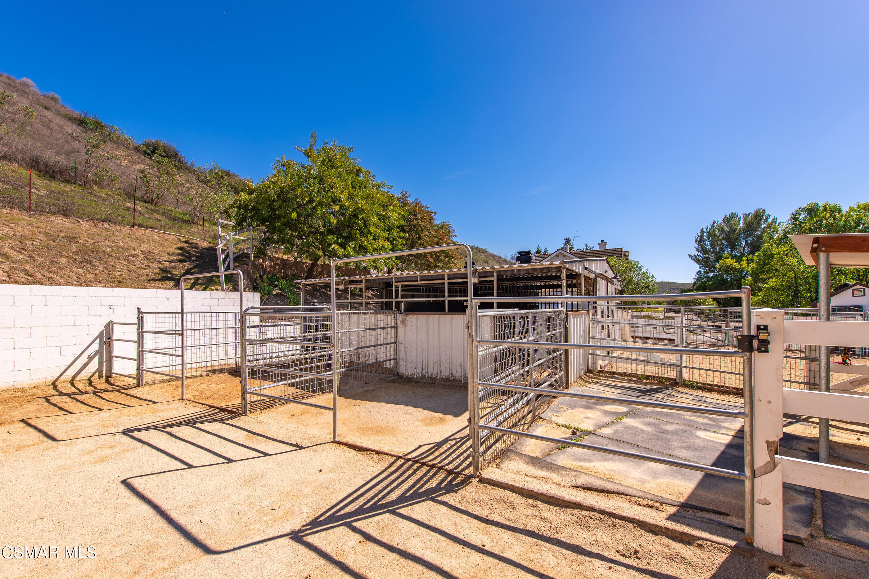 6144 Chesebro Road Agoura Hills, CA 91301 - Photo 56 of 73 a view of a balcony with a floor to ceiling window next to a yard