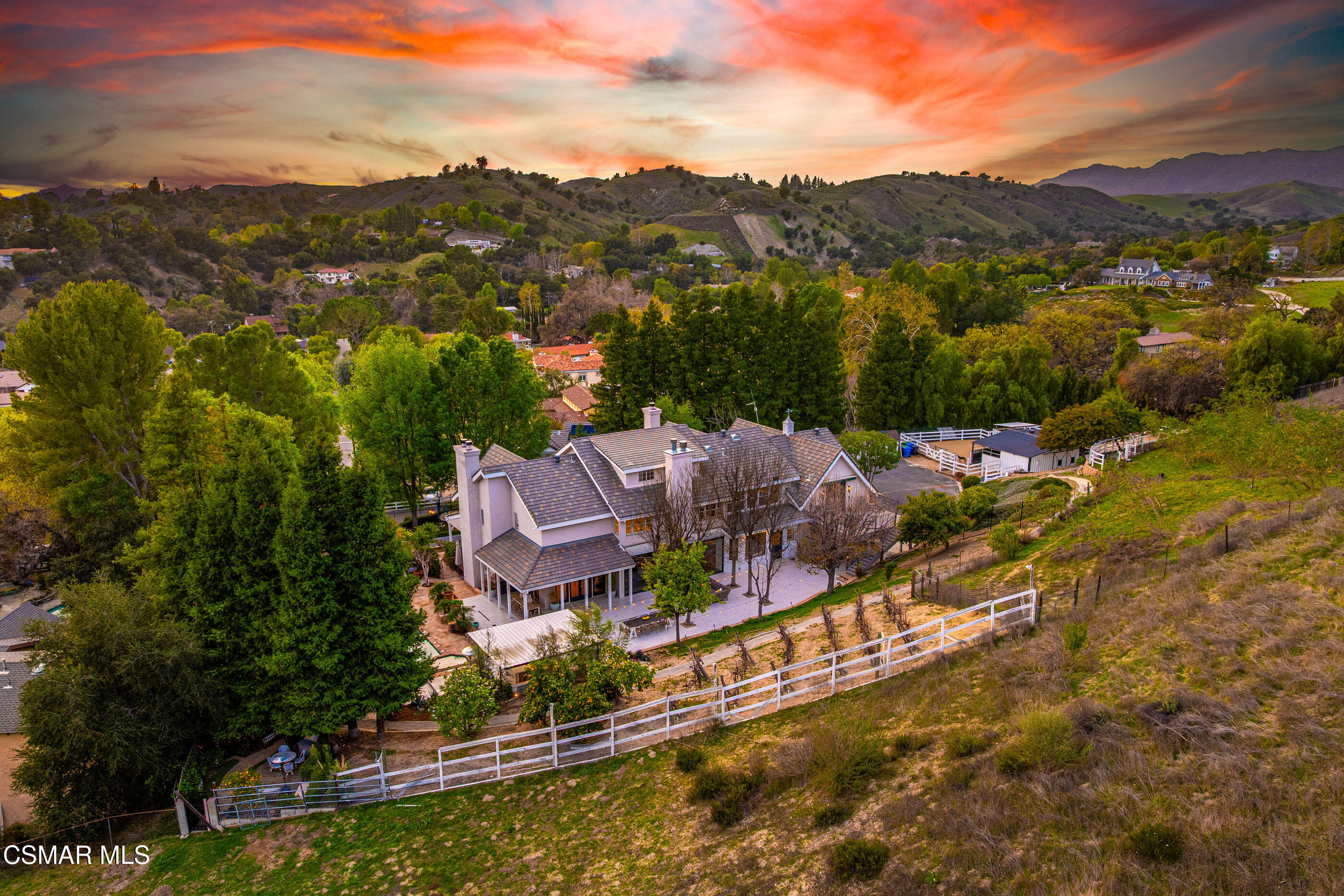6144 Chesebro Road Agoura Hills, CA 91301 - Photo 62 of 73 an aerial view of a house with a garden and lake view