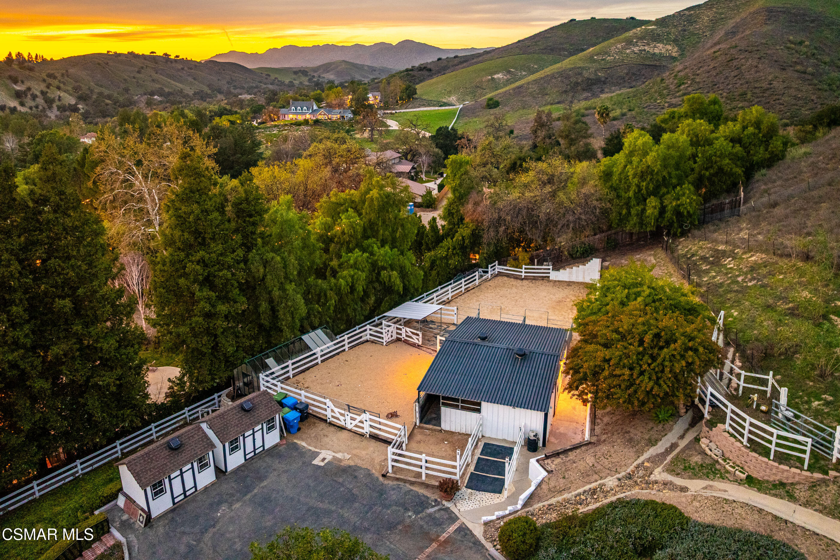 6144 Chesebro Road Agoura Hills, CA 91301 - Photo 66 of 73 an aerial view of a house with a yard and lake view