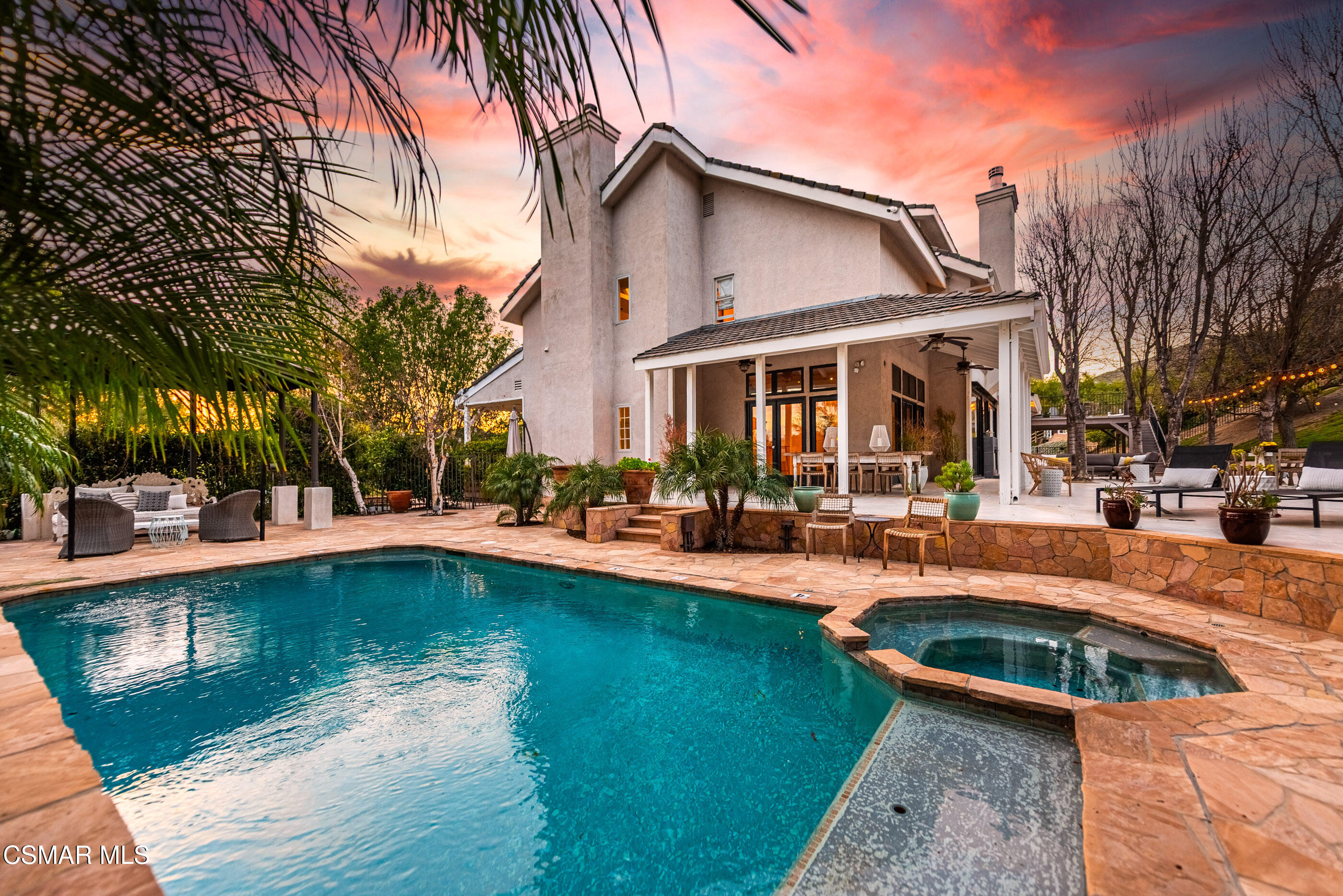 6144 Chesebro Road Agoura Hills, CA 91301 - Photo 70 of 73 a view of a house with swimming pool and sitting area