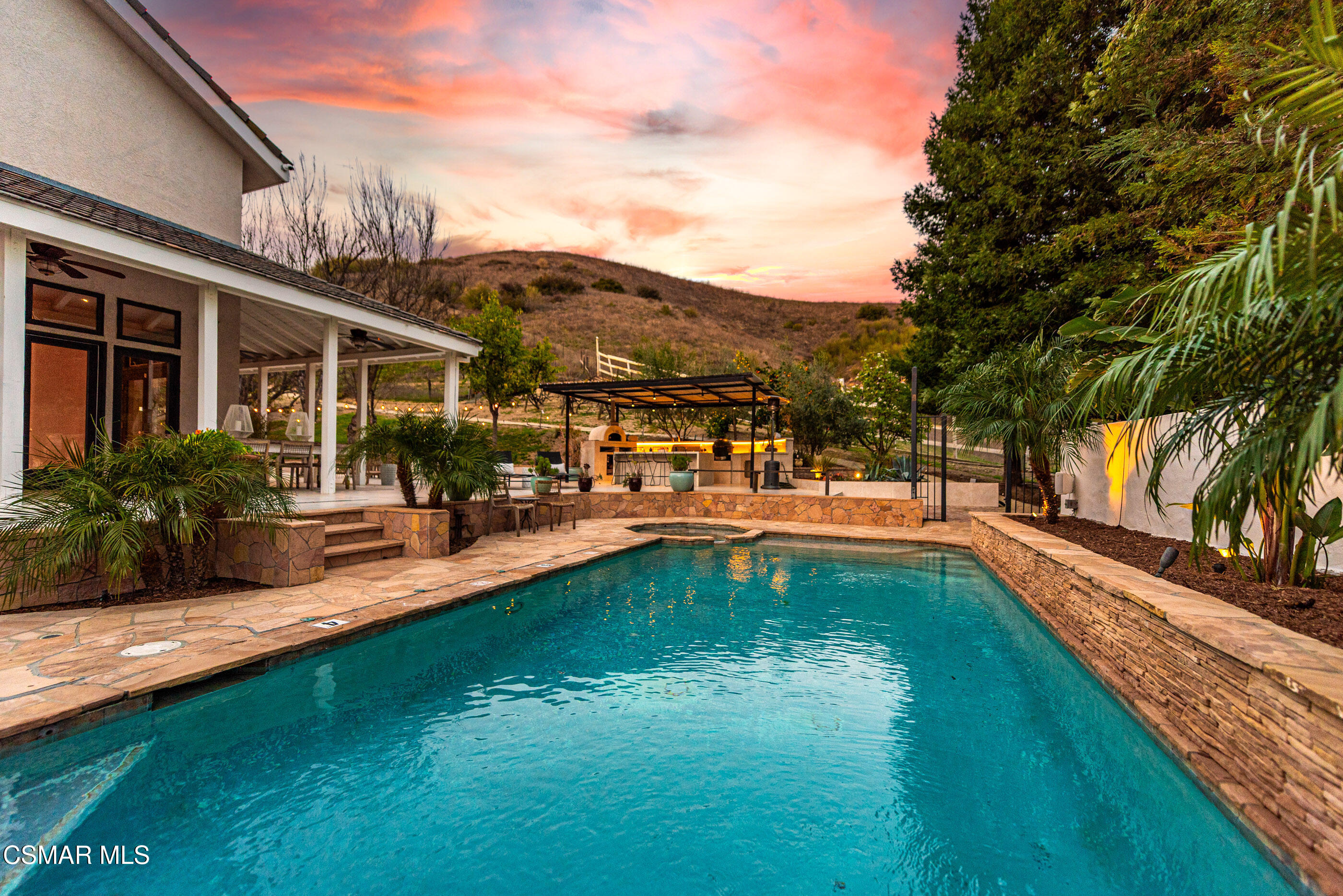 6144 Chesebro Road Agoura Hills, CA 91301 - Photo 71 of 73 a view of a swimming pool with a patio