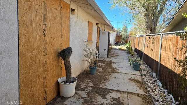 a view of a pathway with a fountain