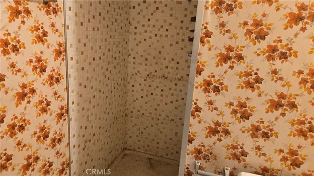 a bathroom with a shower curtain