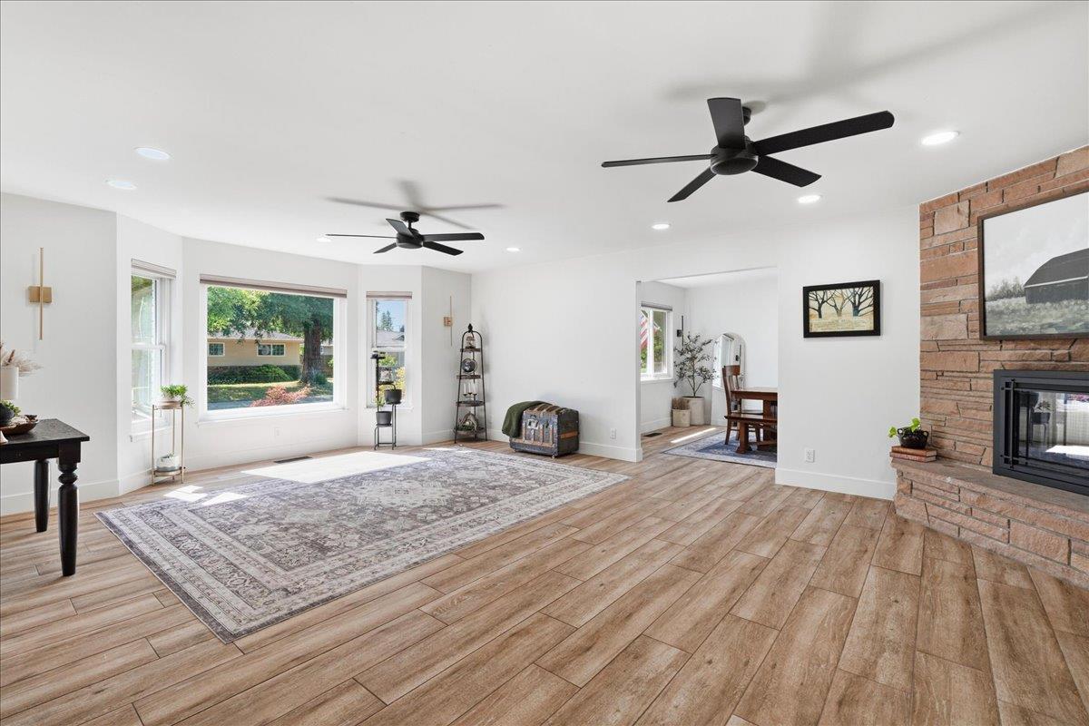 4849 Alexon Way Carmichael, CA 95608 - Photo 8 of 50 a bedroom with a bed and a fireplace