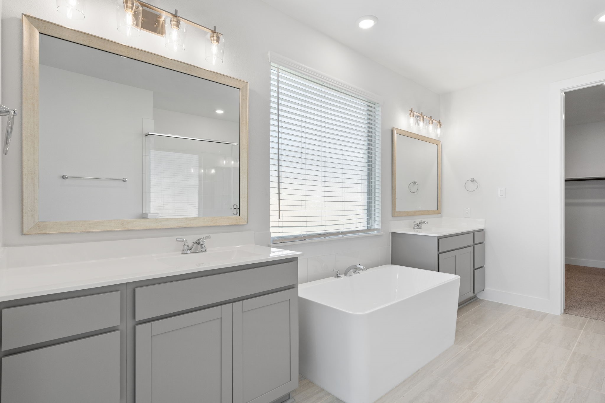 620 Cross Timbers Trace Waller, TX 77484 - Photo 25 of 36 a bathroom with a sink and a bathtub