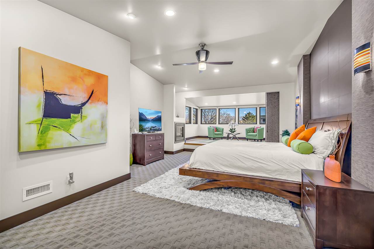 702 Golfmore Drive, Unit C Grand Junction, CO 81506 - Photo 11 of 21 a living room with furniture and a flat screen tv