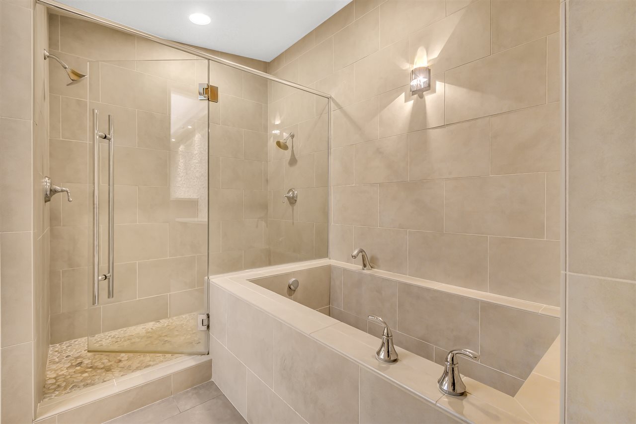 702 Golfmore Drive, Unit C Grand Junction, CO 81506 - Photo 13 of 21 a bathroom with a bathtub and a shower