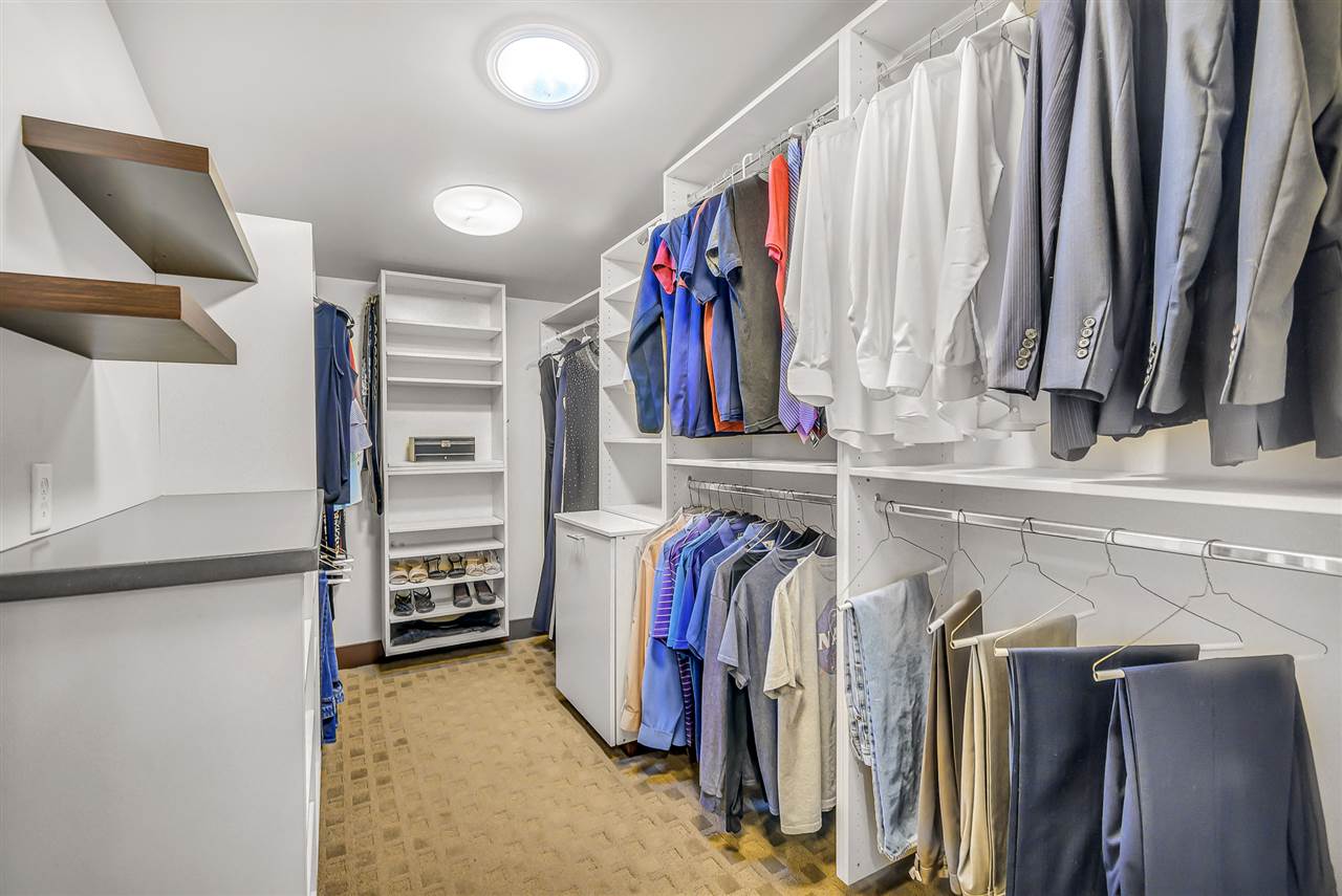 702 Golfmore Drive, Unit C Grand Junction, CO 81506 - Photo 14 of 21 a view of walk in closet with clothes and shoes