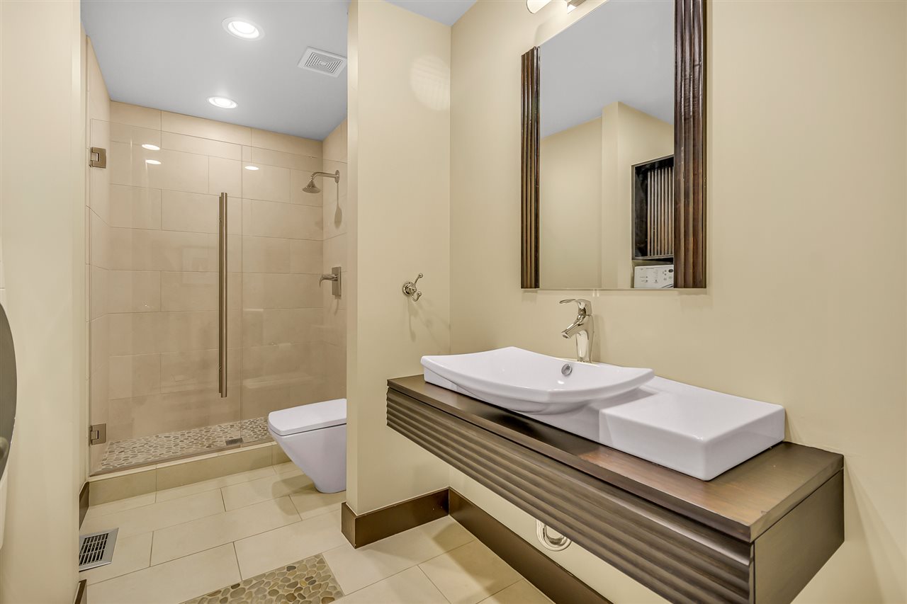 702 Golfmore Drive, Unit C Grand Junction, CO 81506 - Photo 18 of 21 a bathroom with a sink and a mirror