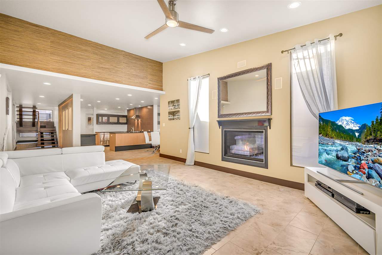 702 Golfmore Drive, Unit C Grand Junction, CO 81506 - Photo 5 of 21 a living room with furniture and a fireplace