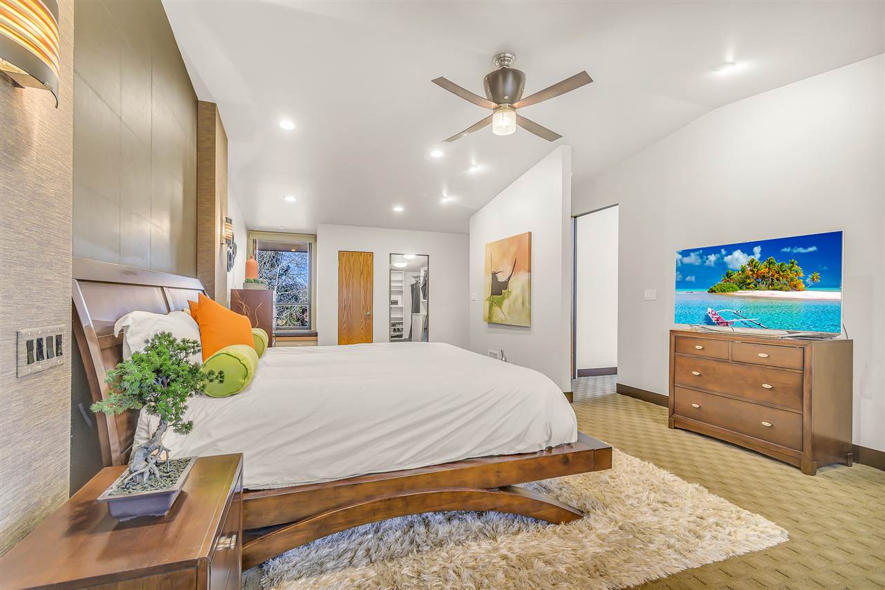 702 Golfmore Drive, Unit C Grand Junction, CO 81506 - Photo 10 of 21 a bed room with a bed window and mirror