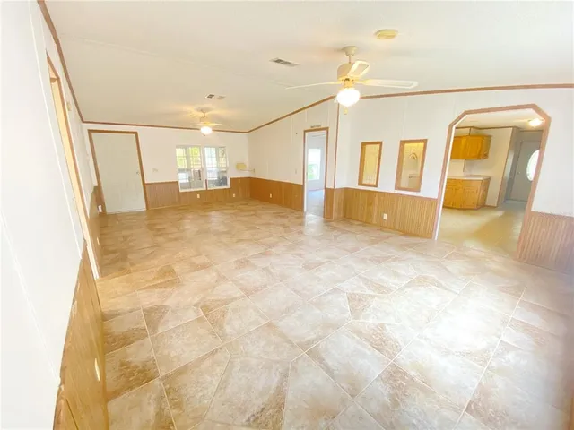 a view of a big room with wooden floor