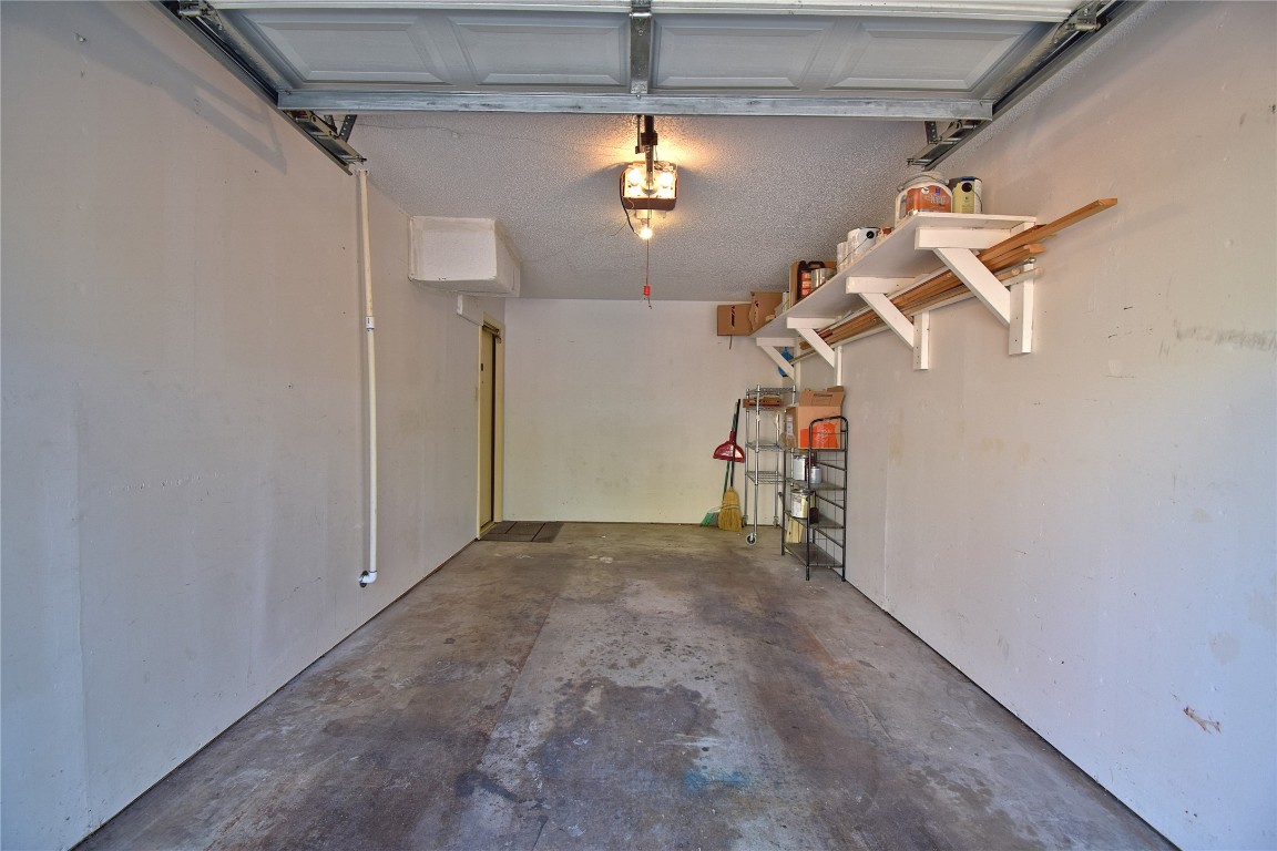 7635 Guadalupe Street, Unit 803 Austin, TX 78752 - Photo 16 of 16 a view of a garage with stairs