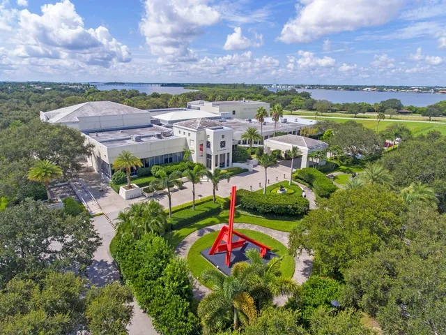 a view of a lake with a yard