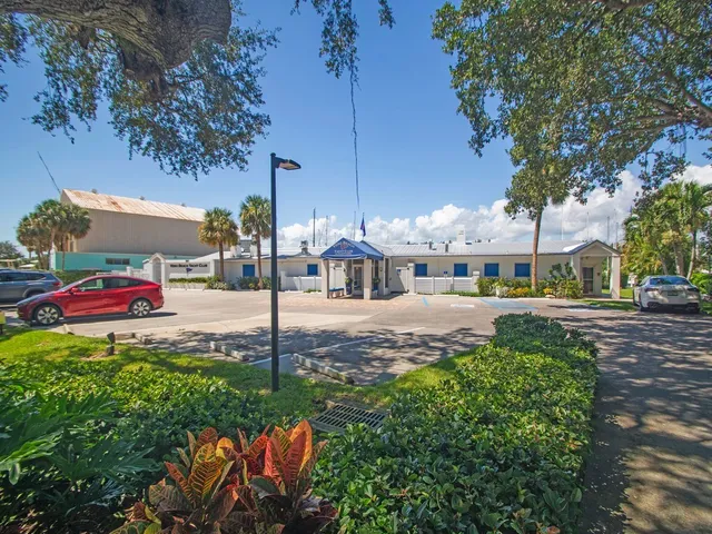 a view of a balcony with yard