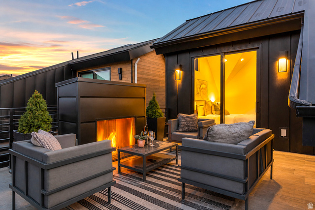 1258 Rothwell Road Park City, UT 84060 - Photo 16 of 48 Rooftop patio featuring a modern fireplace and plank-style flooring