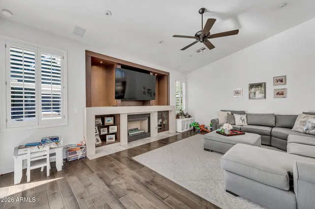 a bathroom with a toilet a sink and a mirror