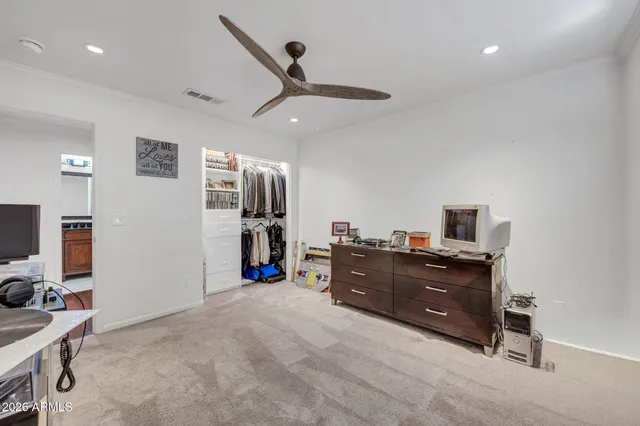 a view of a house with swimming pool and sitting area