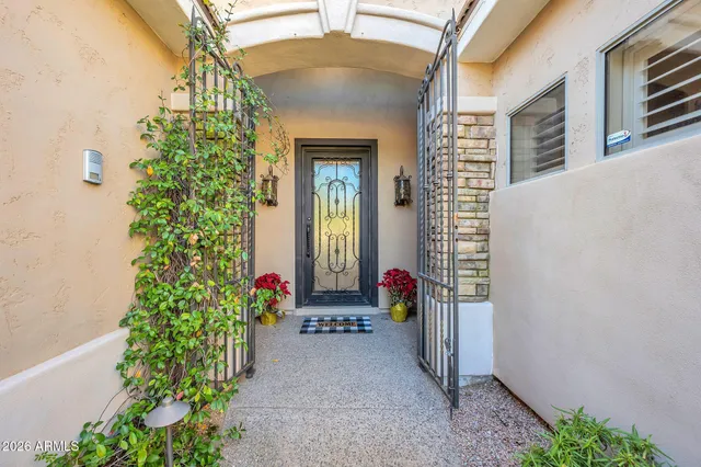 a view of livingroom with furniture and a potted plant